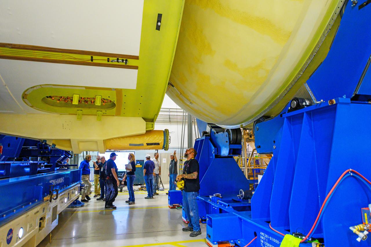 NASA finished assembling and joining the main structural components for the largest rocket stage the agency has built since the Saturn V that sent Apollo astronauts to the Moon. Engineers at the agency’s Michoud Assembly Facility in New Orleans connected the last of the five sections of the Space Launch System (SLS) rocket core stage Sept. 19. The stage will produce 2 million pounds of thrust to send Artemis I, the first flight SLS and NASA’s Orion spacecraft to the Moon. The engine section is located at the bottom of the 212-foot-tall stage and houses the four RS-25 engines. The core stage’s two liquid propellant tanks and four RS-25 engines will produce more than 2 million pounds of thrust to send the SLS rocket and Orion on the Artemis lunar missions. The engine section houses the four RS-25 engines and includes vital systems for mounting, controlling and delivering fuel form the propellant tanks to the rocket’s engines.  Offering more payload mass, volume capability and energy to speed missions through space, the SLS rocket, along with NASA’s Gateway in lunar orbit and Orion, is part of NASA’s backbone for deep space exploration and the Artemis lunar program. No other rocket is capable of carrying astronauts in Orion around the Moon in a single mission.